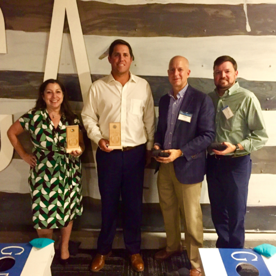 Photo: Image of Michele Bresnick Walsh, Mike Kelly, Chris Rahl and Ben Hoyle - winners of EMERGE Launch Party's CornholeTournament on September 26 at City Garage.