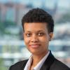 LeSabre Hubbard in formal photo wearing a white shirt and black blazer